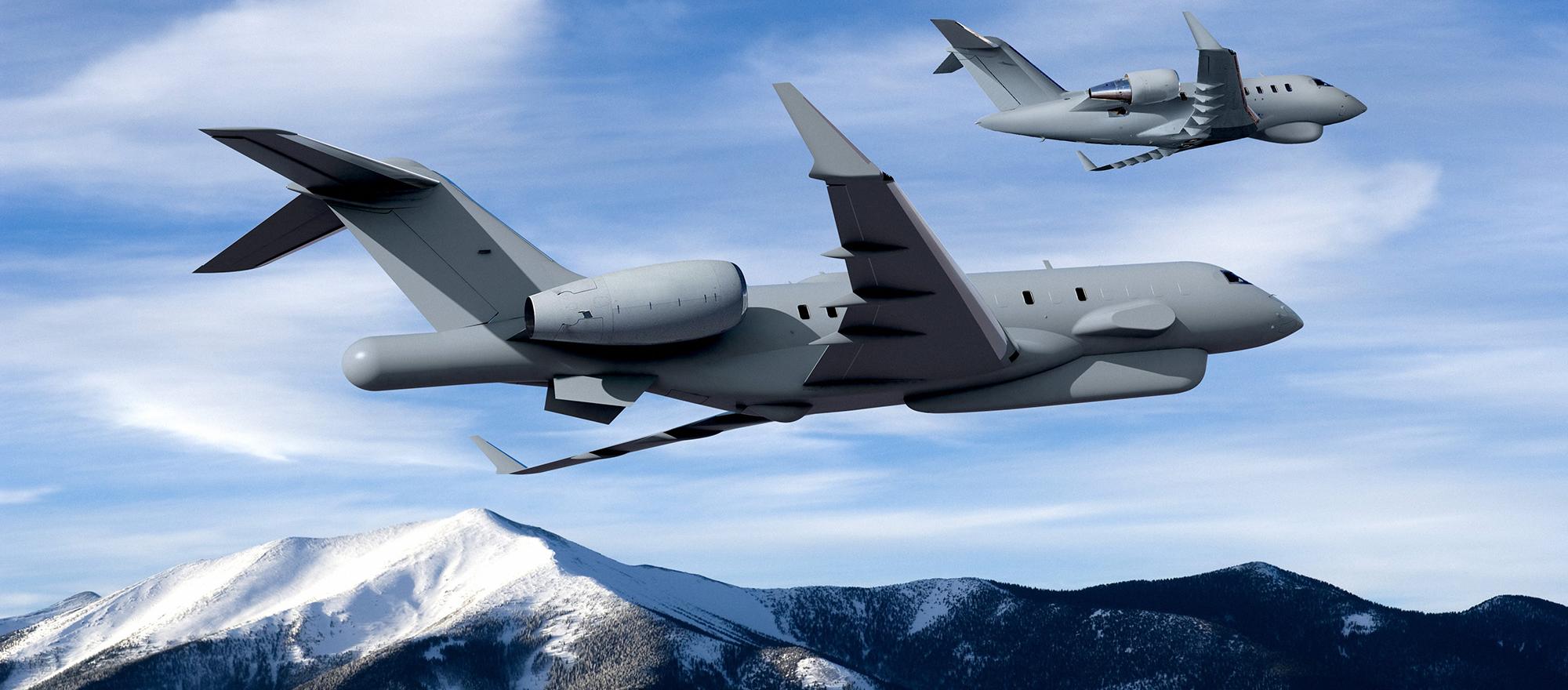 Bombardier global and challenger aircraft in defense configurations flying together