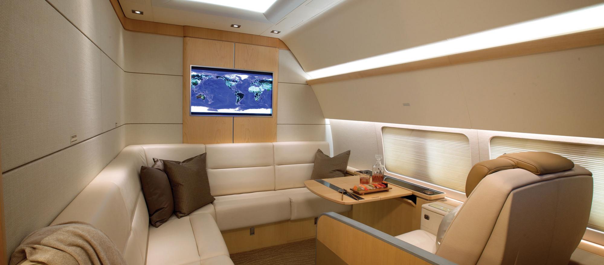 Luxury interior of a Boeing BBJ with pod seats.