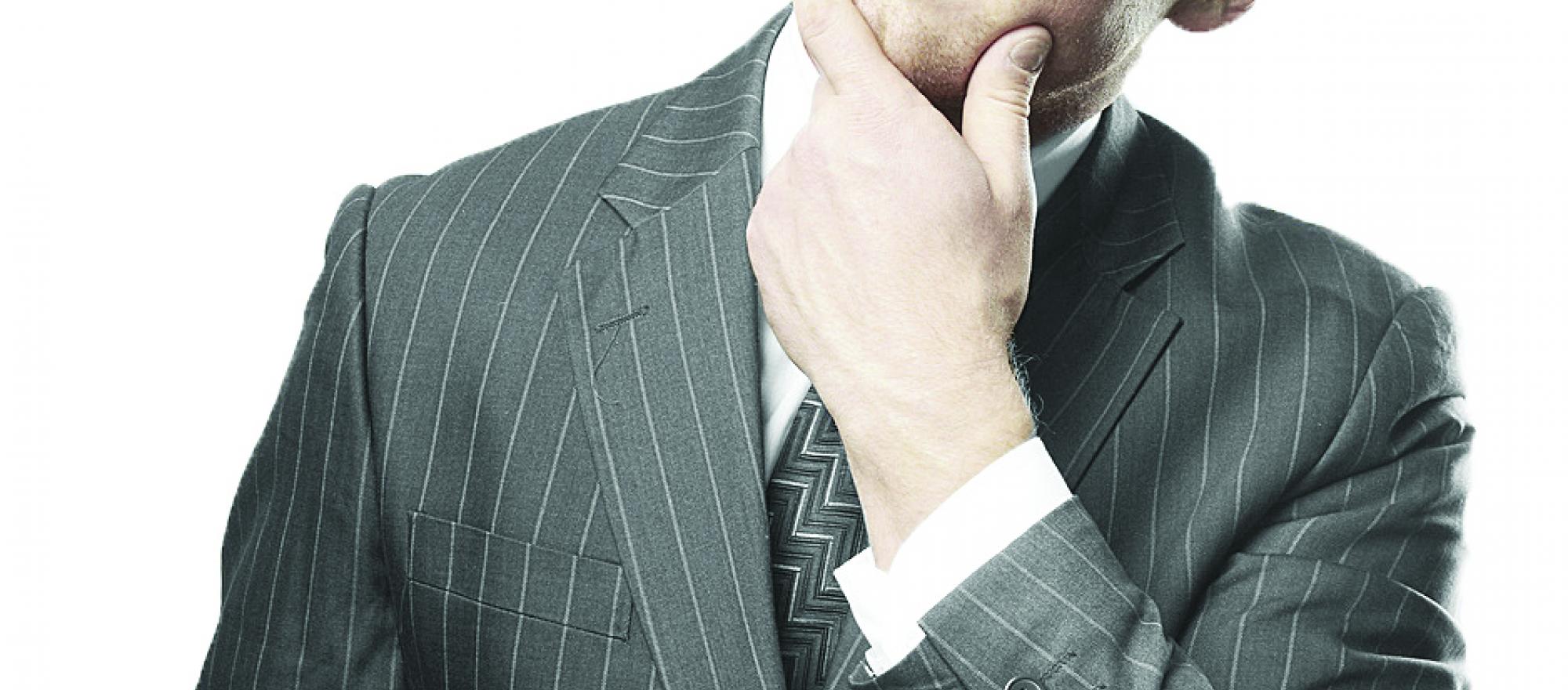 Man pondering decision.