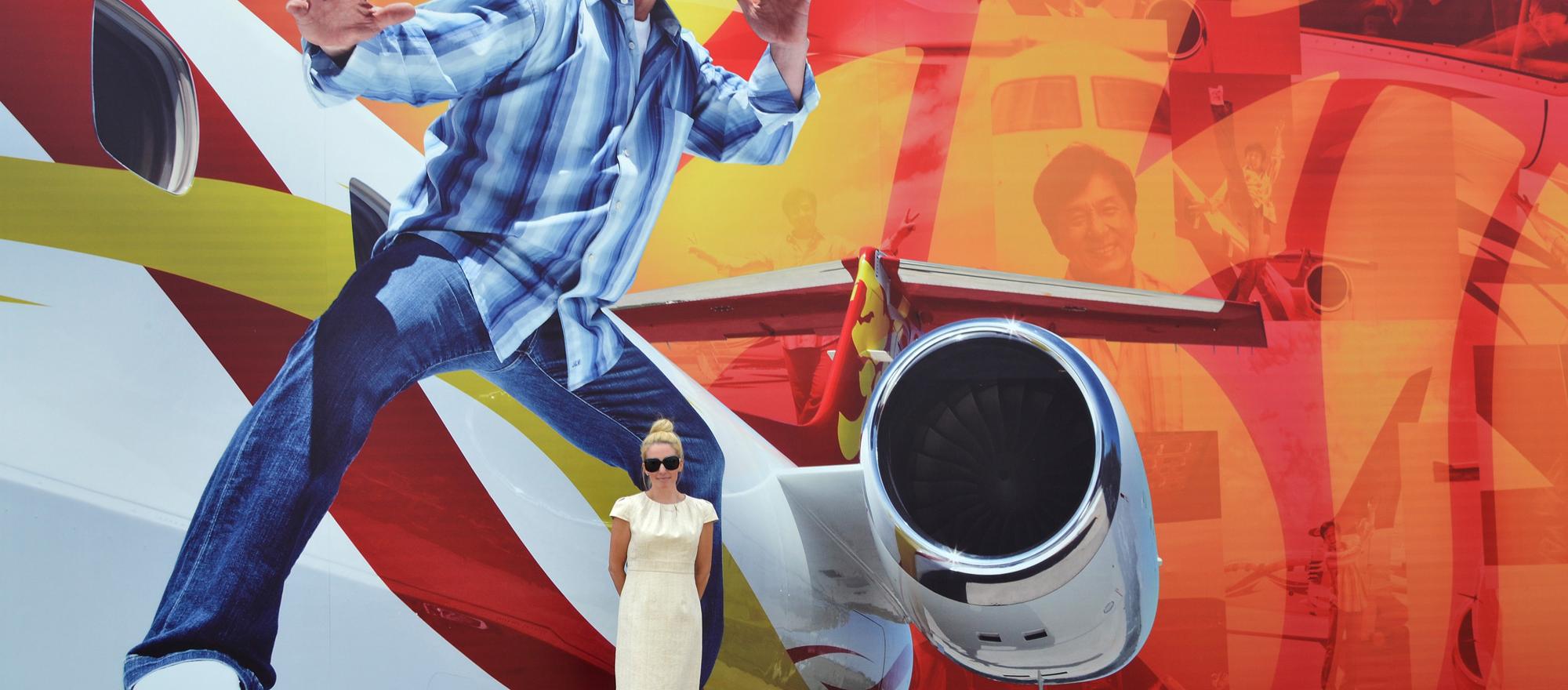 BJT's editorial director Jennifer Leach English in front of a Jackie Chan display (photo: Mona L. Brown)