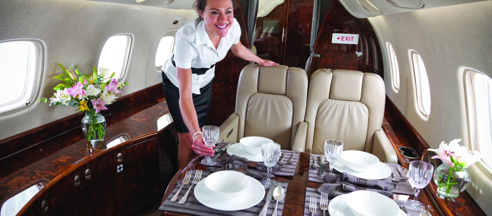 Flight attendants prepare and serve gourmet meals, help passengers navigate entertainment systems and provide life-saving help in an emergency. (Photo: TWC Aviation)