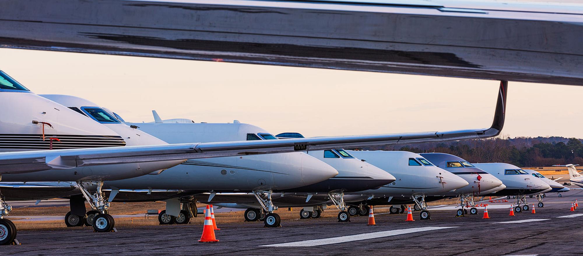 Business jets on the ramp.