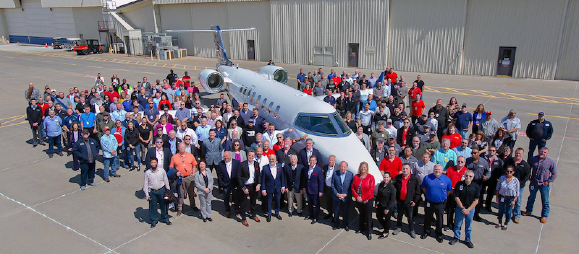 Learjet employees and Bombardier senior executives pose with the final production Learjet to be delivered. (Photo: Bombardier)