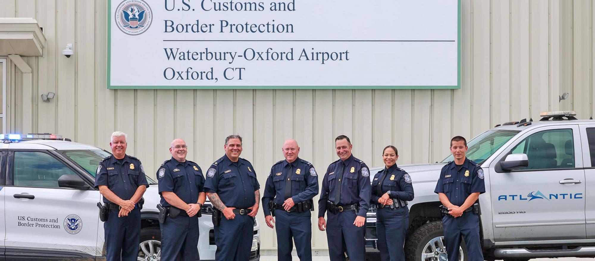Customs and Border Protection officers outside the new CBP facility at Waterbury-Oxford Airport 