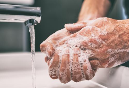 man washing hands