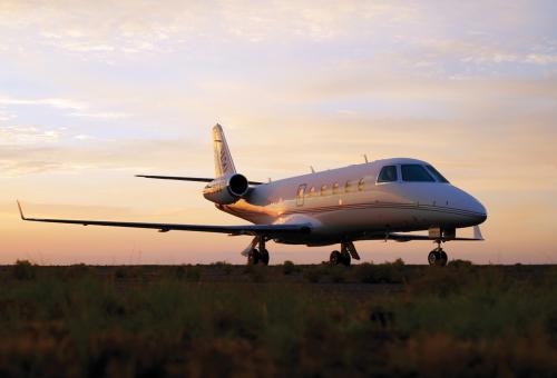 Gulfstream G150 on the ramp at sunset