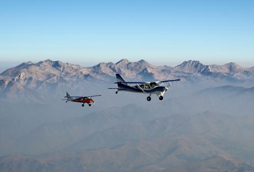 Hartzell Propeller CEO Joe Brown took this photo from his Glasair Sportsman of the same model being flown  by General Aviation Manufacturers Association president and CEO Pete Bunce (left) and former Jeppesen  CEO Mark Van Tine. Brown’s Sportsman features advanced avionics that could find a home in a wider range  of aircraft, thanks to new FAA rules.
