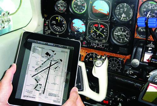 Charts, operating manuals and maintenance data that used to weigh up to 80 po