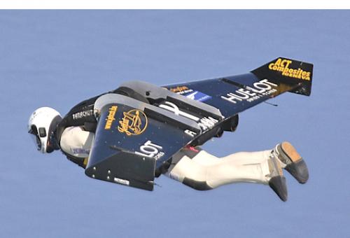 Yves Rossy flew over the English Channel with a wing that he steers by moving