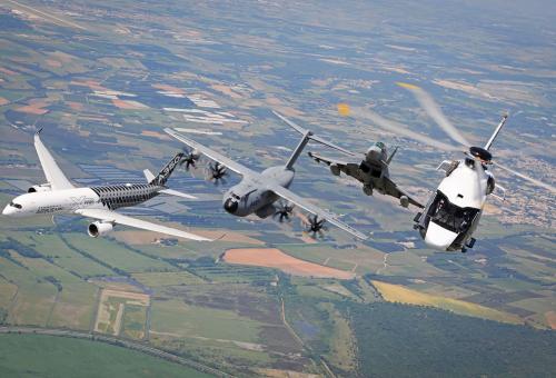 The Airbus A350XWB airliner, the A400M airlifter, the Eurofighter, and the H160 helicopter in formation.