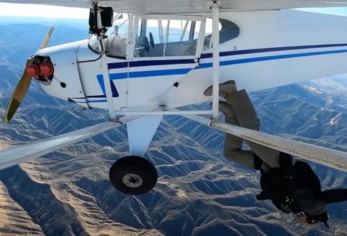 Jacob bailing out of his Taylorcraft.