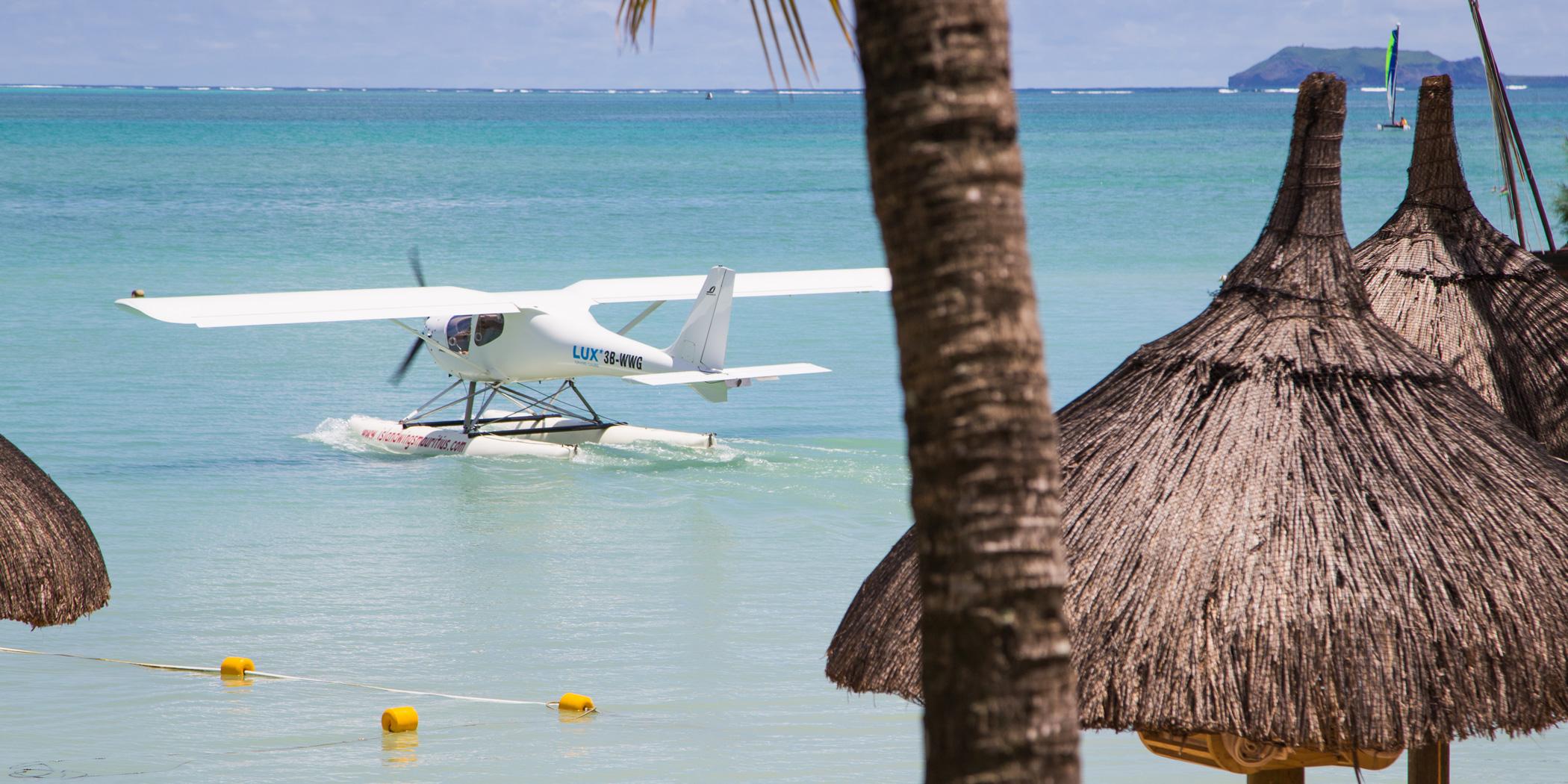  A seaplane parked in front of a resort on the north coast.