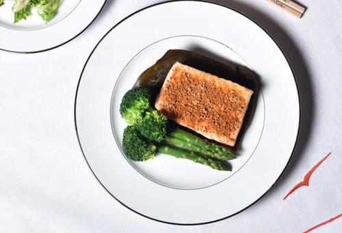 VistaJet exclusive dish—Nobu steamed salmon dry miso on plate